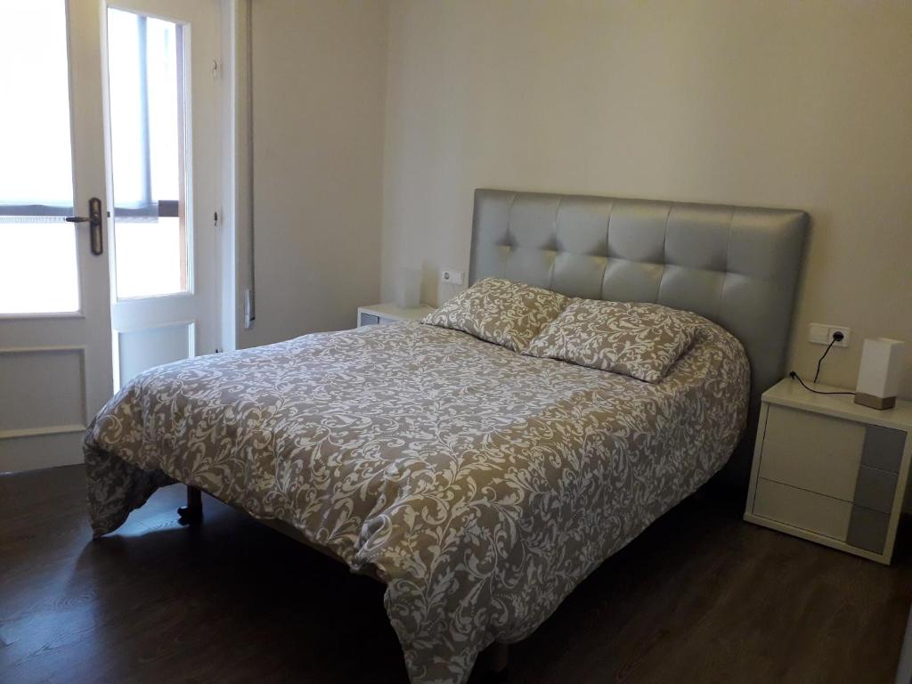 Dormitorio doble con luz natural